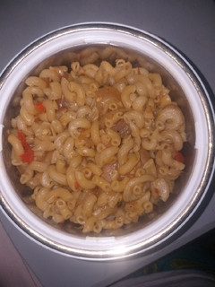 A picture of Jollof twist macaroni with liver.
