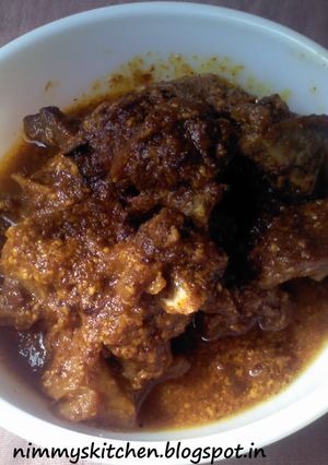 A picture of Tangy Spicy Mutton Curry.