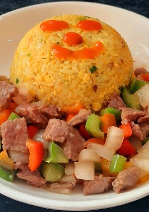 A picture of Shaking Beef Fried Rice.