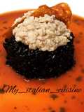 Riso nero integrale con ragù di cicale di mare su bisque al pomodoro