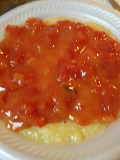 A picture of Grits, Smoked Sausage, and Tomato Gravy.