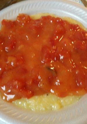 A picture of Grits, Smoked Sausage, and Tomato Gravy.