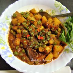 A picture of Kasuri Aloo Matar (Potato Peas Curry with Fenugreek Leaves).
