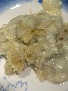 A picture of Farfalle paste in potato sauce.