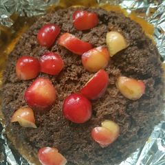 A picture of Biscuit mango icecream cake.
