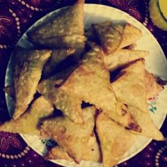 A picture of Crispy green chilli kheema onion samosa.