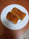 Rollitos de manzana, melocotón y crema pastelera