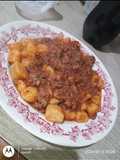 Ñoquis de calabaza y papa con bolognesa