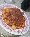 Ñoquis de calabaza y papa con bolognesa