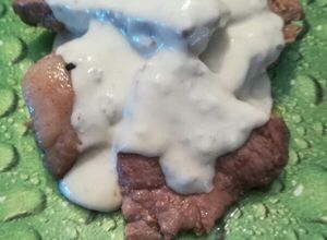 Foto principal de Cabeza de lomo en salsa de queso azul