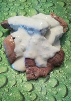 Una foto de Cabeza de lomo en salsa de queso azul