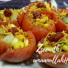 Sweet Corn Chaat Tomato Bowls A picture of Sweet Corn Chaat Tomato Bowls.