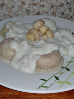 Una foto de Sorrentinosss caseros de jamón y queso.