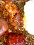 Pounded yam with groundnuts and vegetables soup
