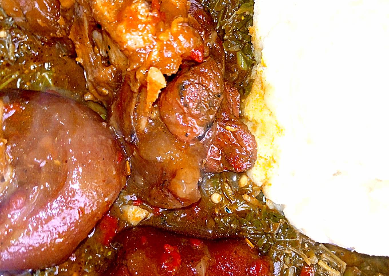Pounded yam with groundnuts and vegetables soup