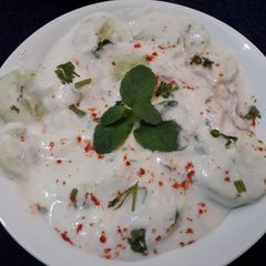 Cucumber onion curd raita very creamy and delicious A picture of Cucumber onion curd raita very creamy and delicious.