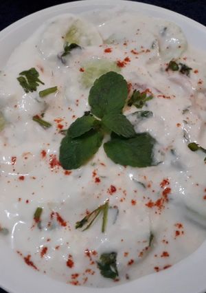 A picture of Cucumber onion curd raita very creamy and delicious.