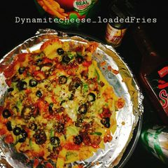 A picture of Dynamite cheese loaded fries.
