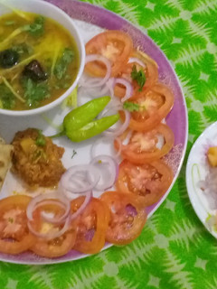 A picture of FRY MAASH KI DAAL WITH ROTI ACHAR & KACHOOMAR SALAD.
