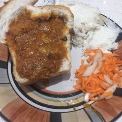 A picture of Mutton Curry Bunny Chow.