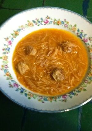 A picture of Noodle Soup with Meatballs.