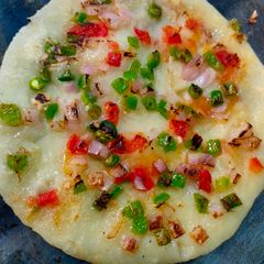 A picture of Uttapam made of rava / sooji.