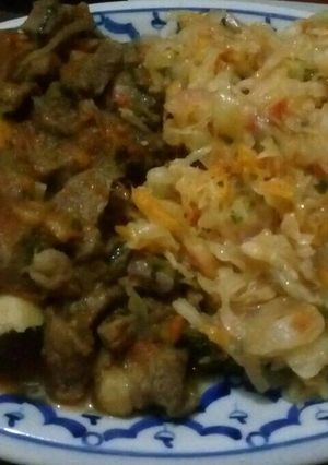 A picture of Beef Stew and Cabbages.