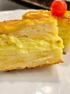 Una foto de Pastel de manzana con crema pastelera