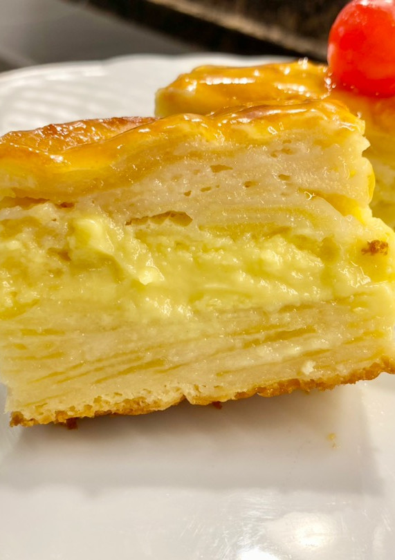 Una foto de Pastel de manzana con crema pastelera