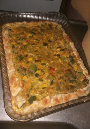 Una foto de Tarta de zapallitos verdes y mix de verdura