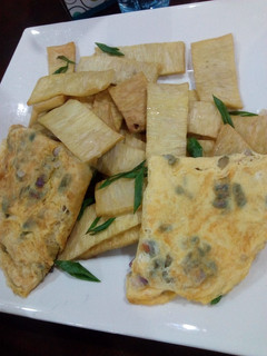 A picture of Fried yam and egg.