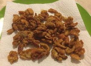Una foto de Chicharrones de pollo y grasa de Pella