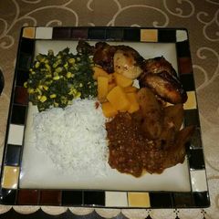 Grilled chicken with spinach and corn A picture of Grilled chicken with spinach and corn.