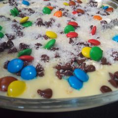 A picture of Mango custard with chocolate chip.