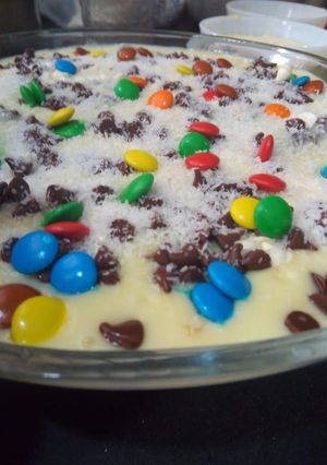 A picture of Mango custard with chocolate chip.