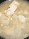 Miso soup with tofu, daikon, onion