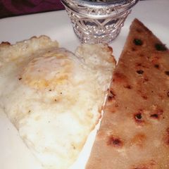 A picture of Half fried Egg.