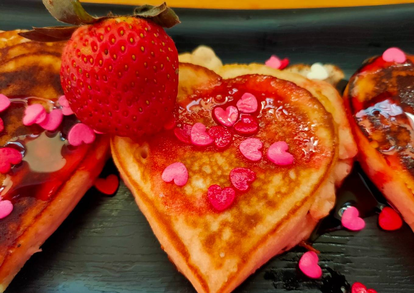 Heart-shaped eggless strawberry pancakes