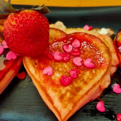 A picture of Heart Shaped Eggless Fluffy Strawberry Pancakes.