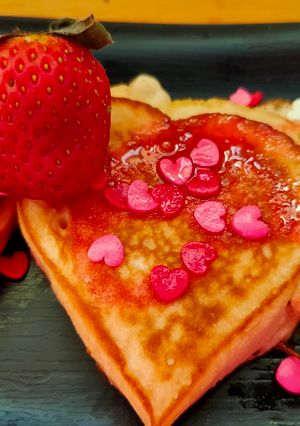 A picture of Heart Shaped Eggless Fluffy Strawberry Pancakes.