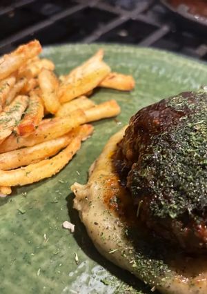 A picture of Japanese Hambagu with Herb Mashed Potatoes and 2x fried Crispy Fries.