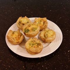 A picture of Individual Ham and Cheese Puff Pastry Quiche.