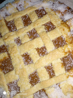 Una foto de Pasta frola de dulce de leche y membrillo