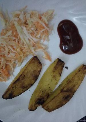 A picture of Pan fried potatoes and coleslaw.