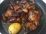 A picture of pork and chicken adobo