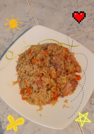 Una foto de Arroz con pollo y zanahoria