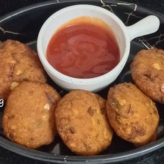 A picture of Parippu Vada Tea Time Snacks.