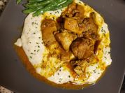 A picture of curried chicken thighs