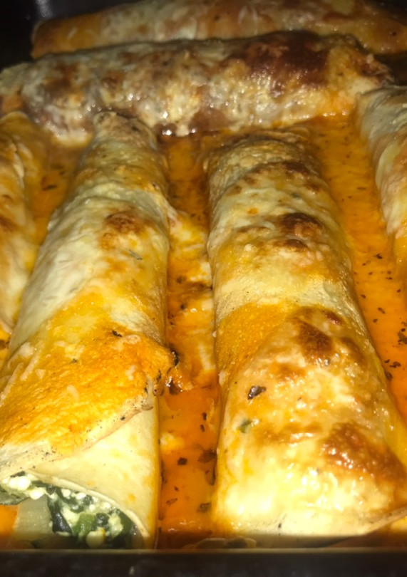 Una foto de Canelones de acelga y ricota