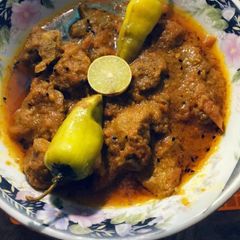A picture of Achar ghousht.
